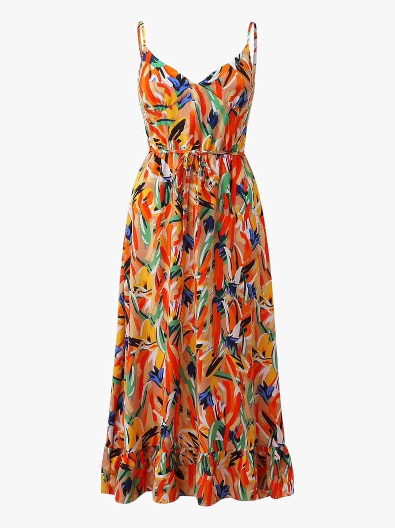 Full-body shot of model in the TropicLush Elegant Dress in orange against a neutral background