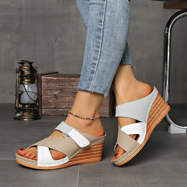 Tulip wedge slides in black brown colorway on white background