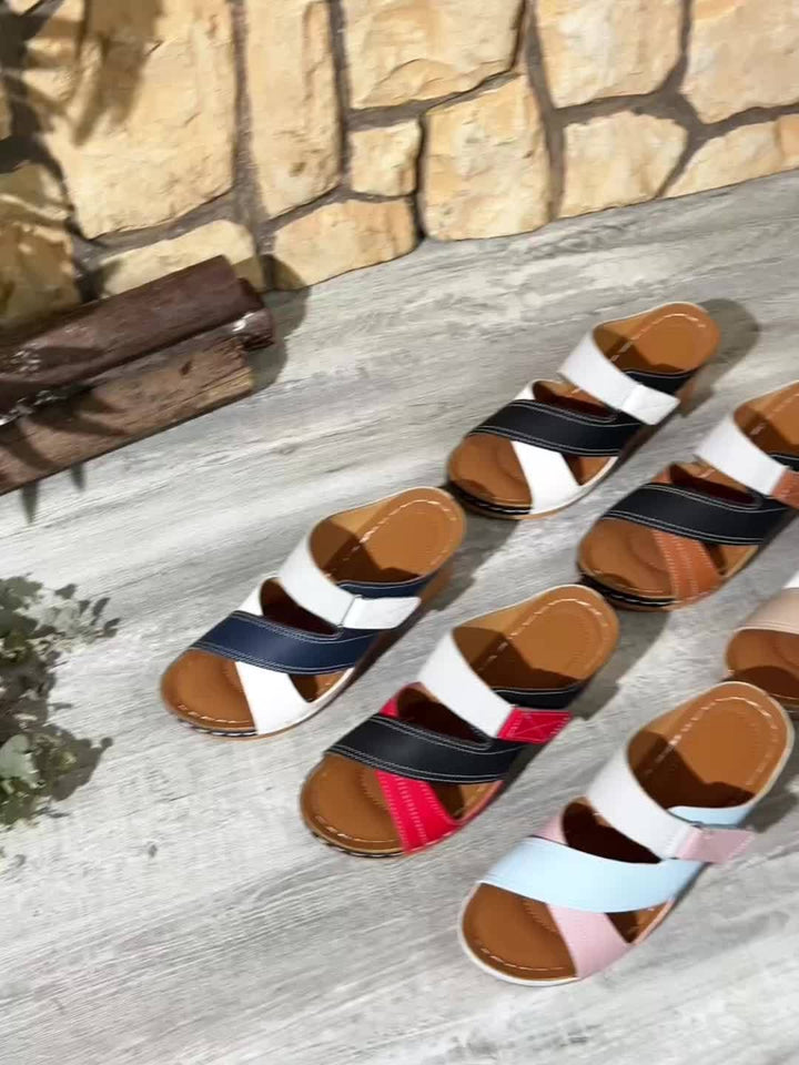 Detail shot of the cushioned footbed interior of Tulip wedge slides