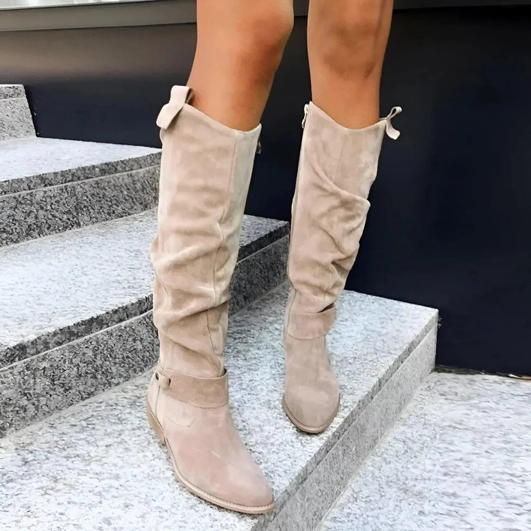 Valencia boots in beige colorway displayed against a clean background