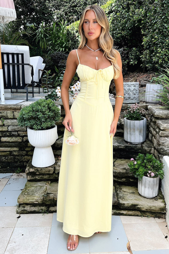 Valentina spaghetti strap wrap maxi dress in yellow with flowing skirt and cinched waist