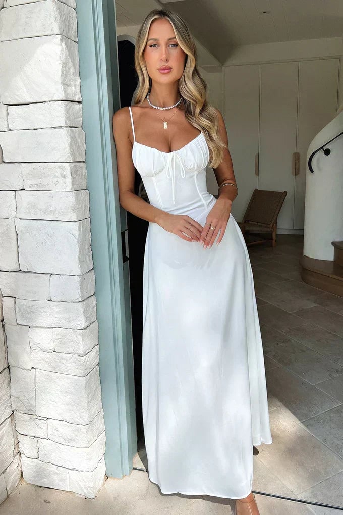 Full-length shot of Valentina wrap maxi dress in blue showing flowing skirt