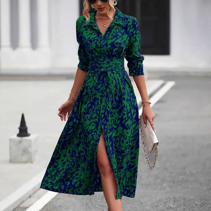 Front view of the Valentina midi shirt dress showing the bold two-tone abstract print and button-down front in green