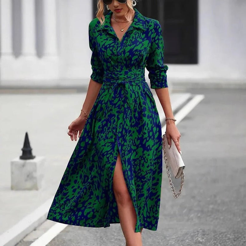 Front view of the Valentina midi shirt dress showing the bold two-tone abstract print and button-down front in green