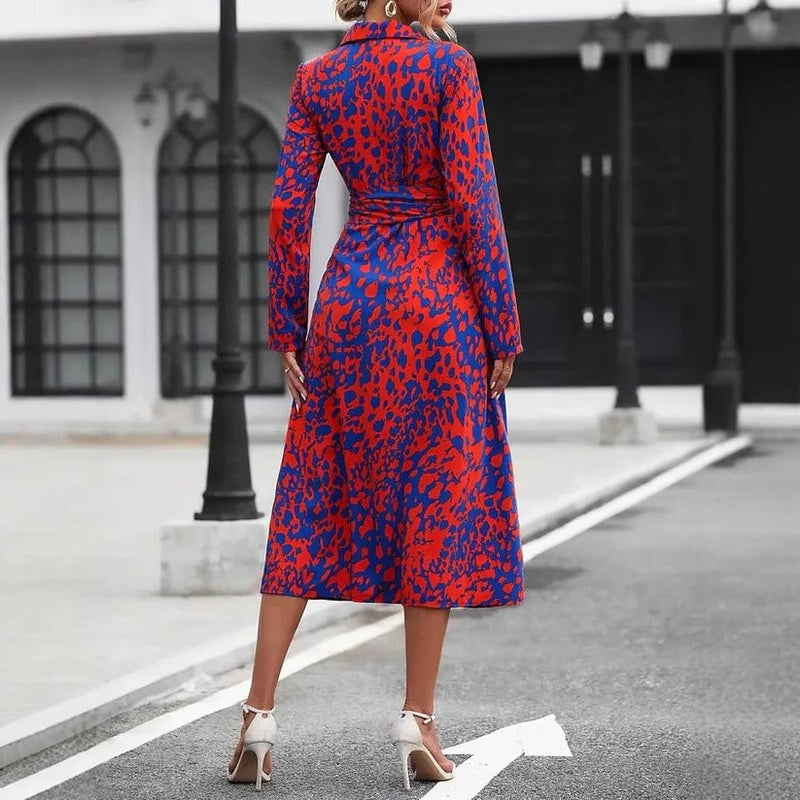 Side view of the Valentina midi shirt dress highlighting the A-line flared skirt and midi length in orange