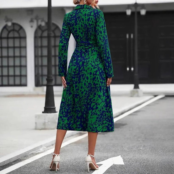 Full-length back view of the Valentina abstract-print belted midi shirt dress in green