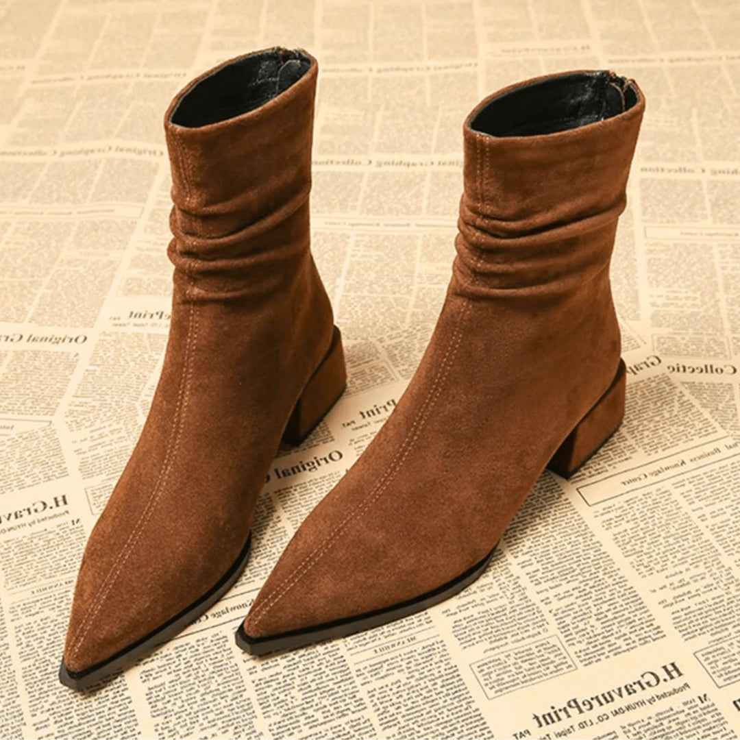 Florimay Valeria classic boot in brown, side view showing sleek silhouette and refined contours
