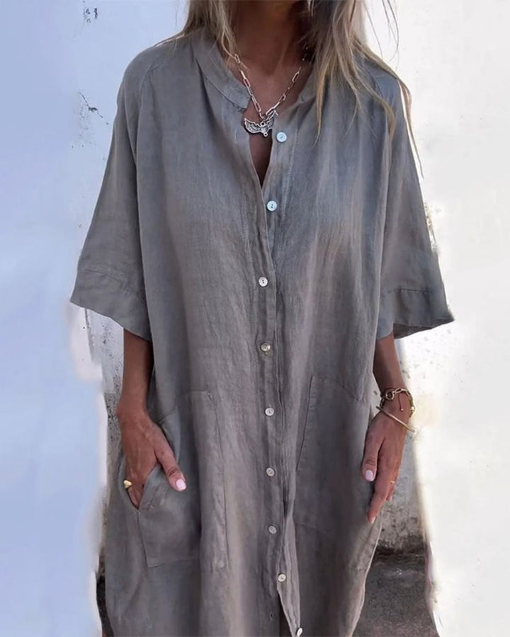 Woman wearing a relaxed-fit boho shirt dress in a flowing silhouette, styled casually for everyday wear