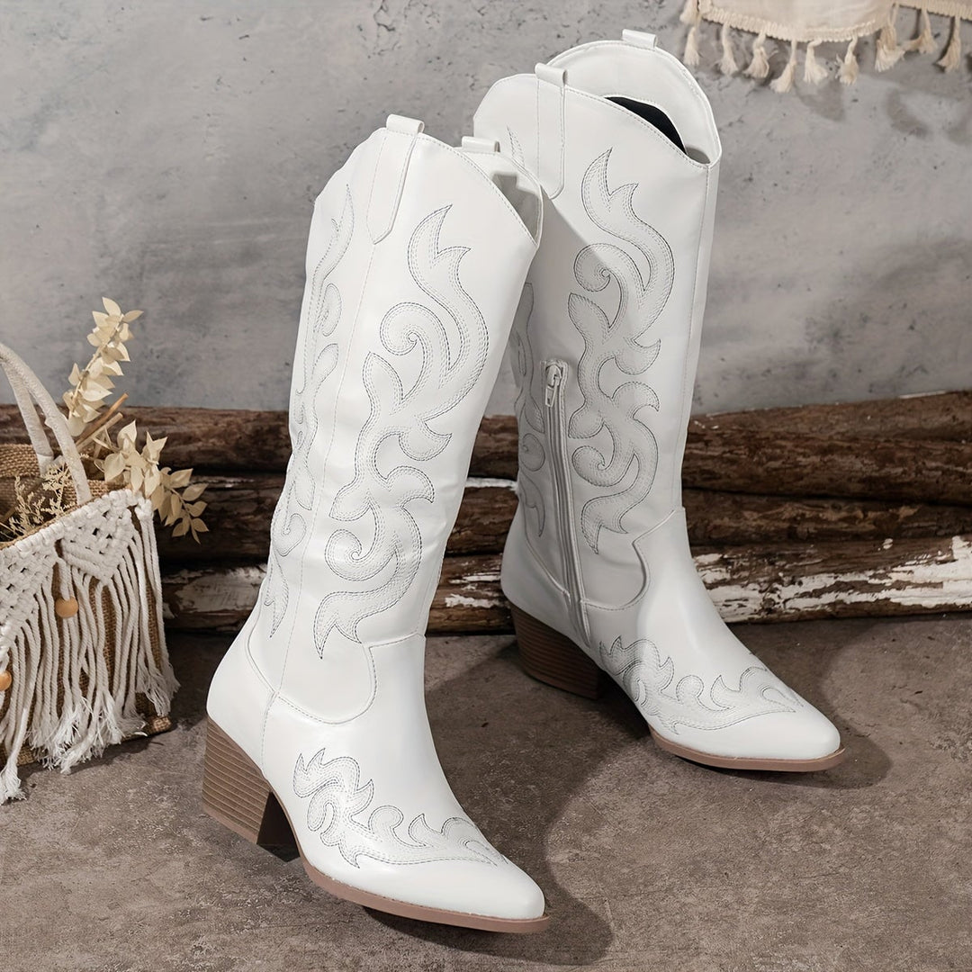 Side profile of the red Winter Grace boot highlighting the smooth silhouette and calf height