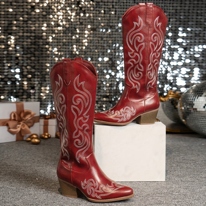 Winter Grace boots in brown styled with skinny jeans tucked in for a classic winter look