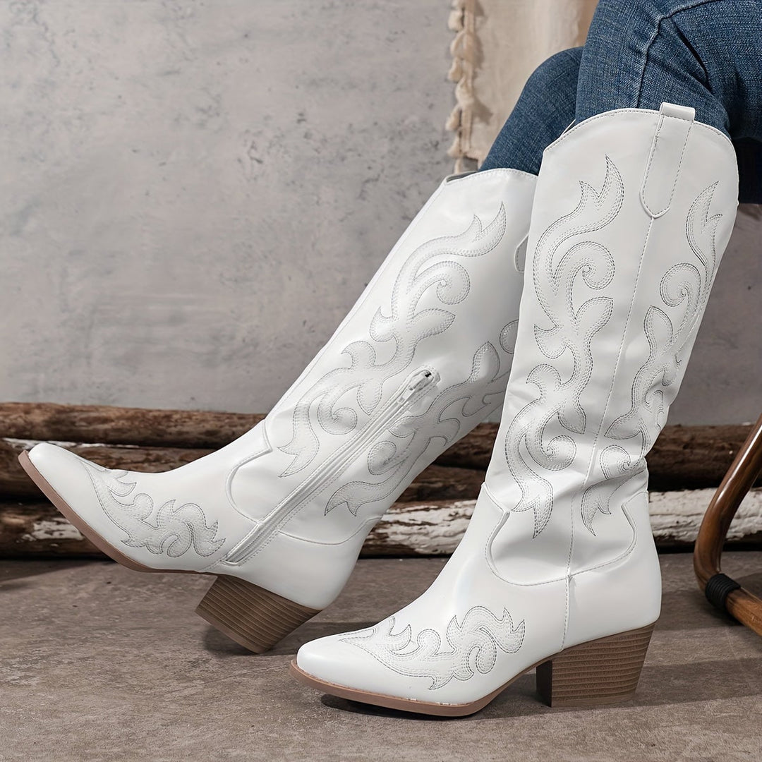 Close-up of the white Winter Grace boot toe and front silhouette detail