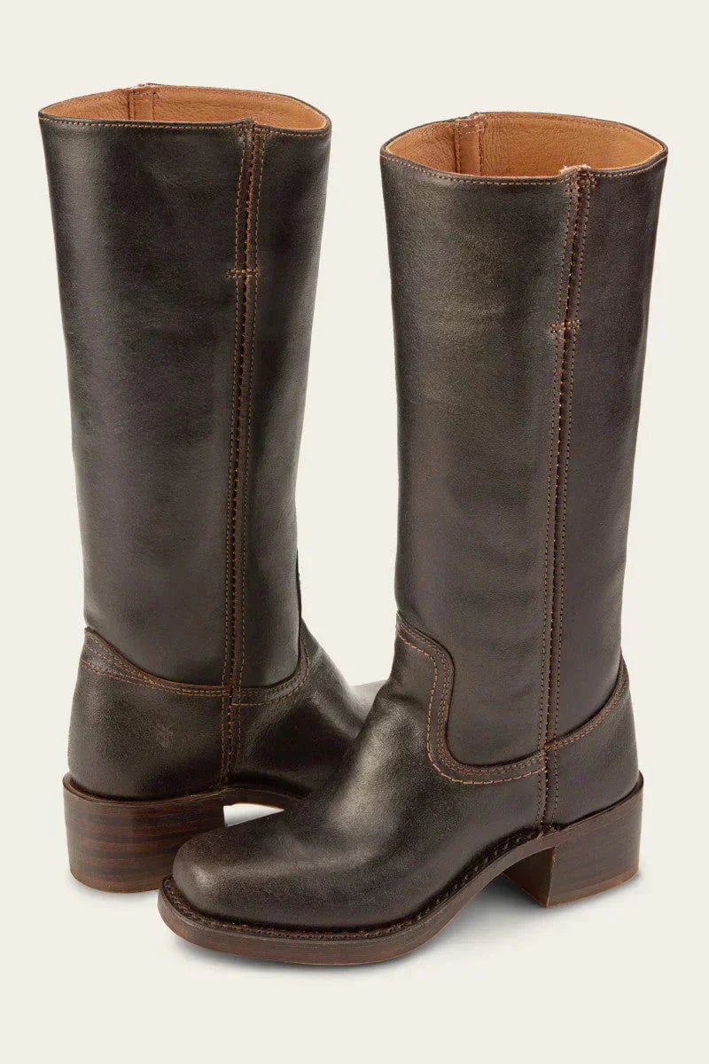 Brown knee-high boots with slim fit and structured sole, front view