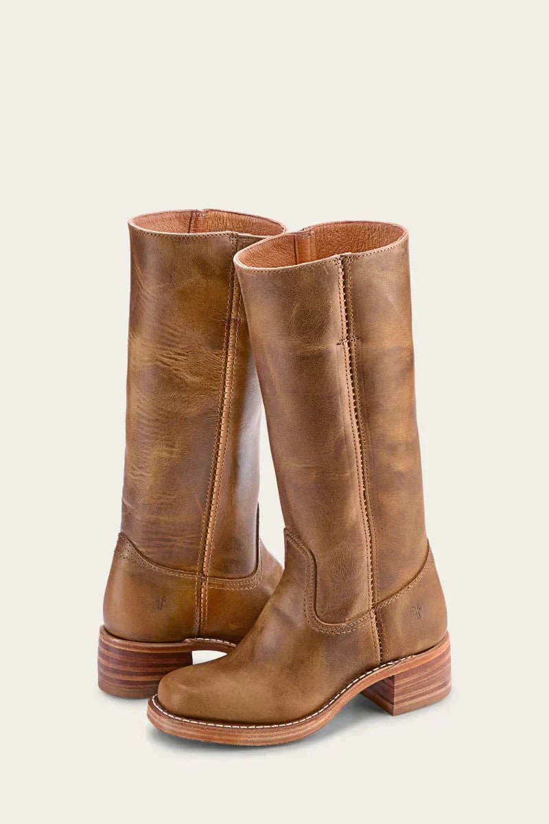 Black knee-high boots with slim fit silhouette, side profile view