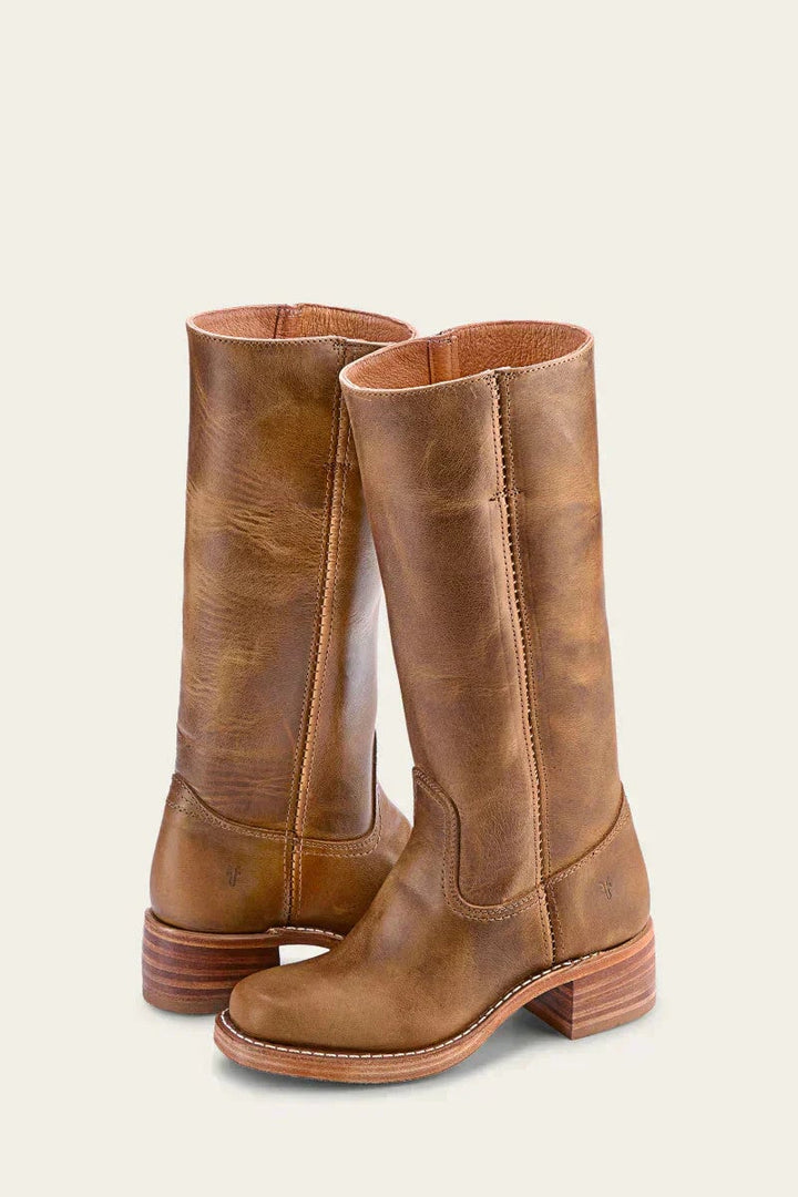Black knee-high boots with slim fit silhouette, side profile view