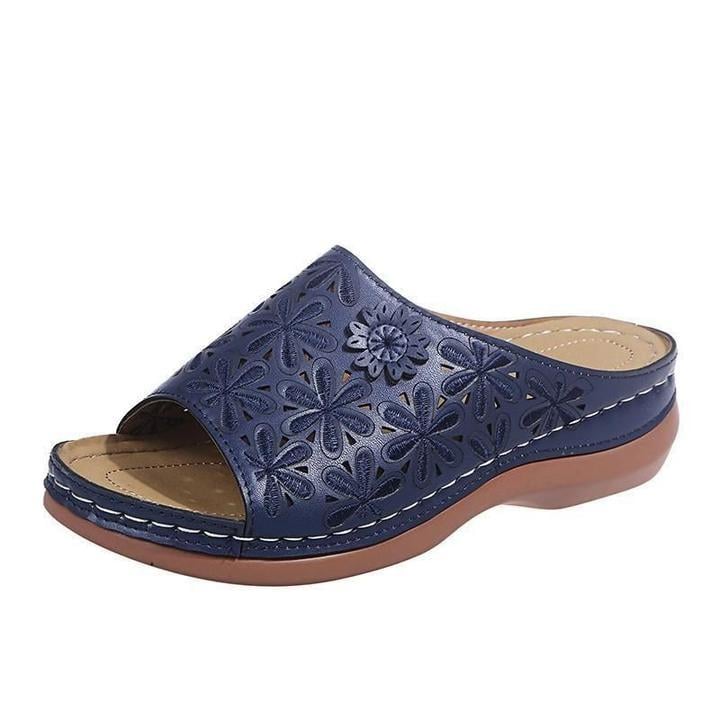 Vanilla blue flat sandals styled with a casual summer outfit, lifestyle shot