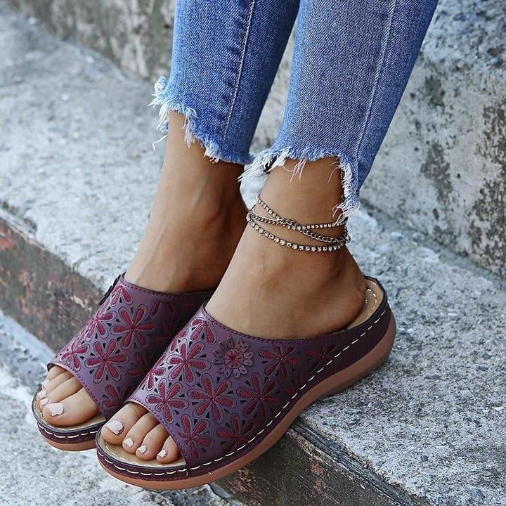 All four color options of Vanilla women's orthopedic flat sandals: wine red, brown, black, and blue