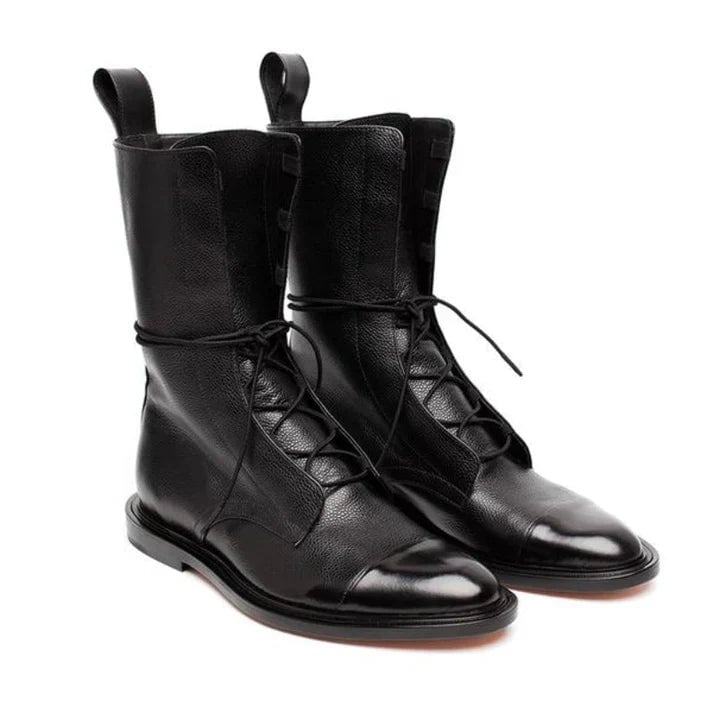 Close-up of black boot upper highlighting polished finish and craftsmanship