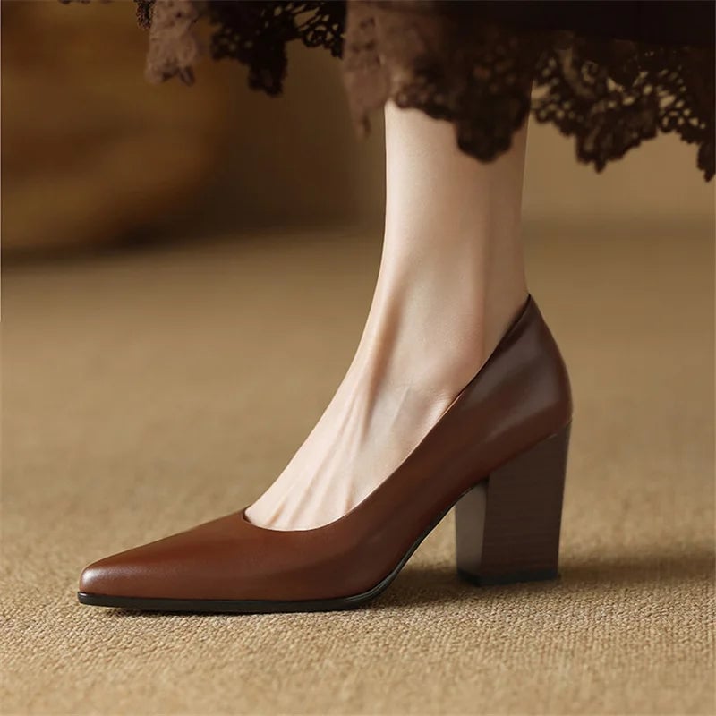 Venetia brown block heel pump styled with a midi skirt