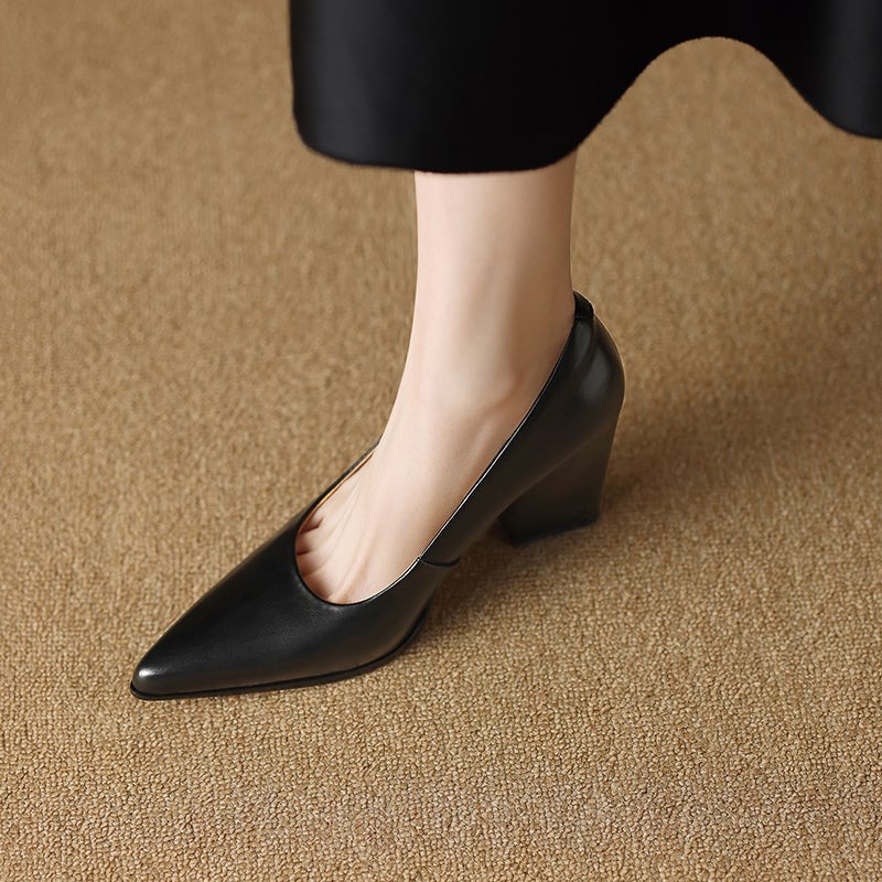 Venetia black block heel pump close-up of heel and sole detail