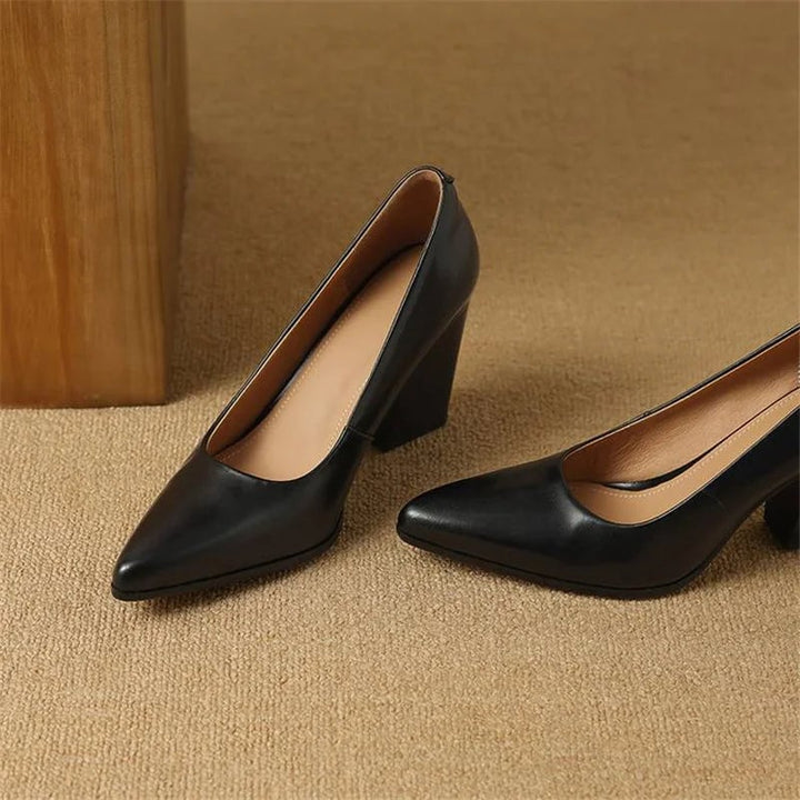 Venetia black block heel pump styled with a pencil skirt