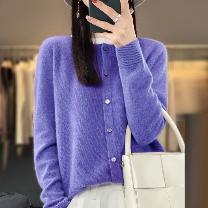 Model wearing a soft buttoned cardigan in a relaxed fit, styled casually for everyday wear