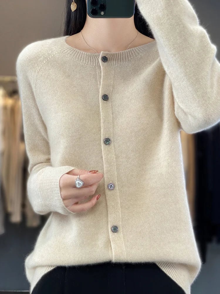 Full-length view of a flattering buttoned cardigan showing relaxed silhouette and refined styling