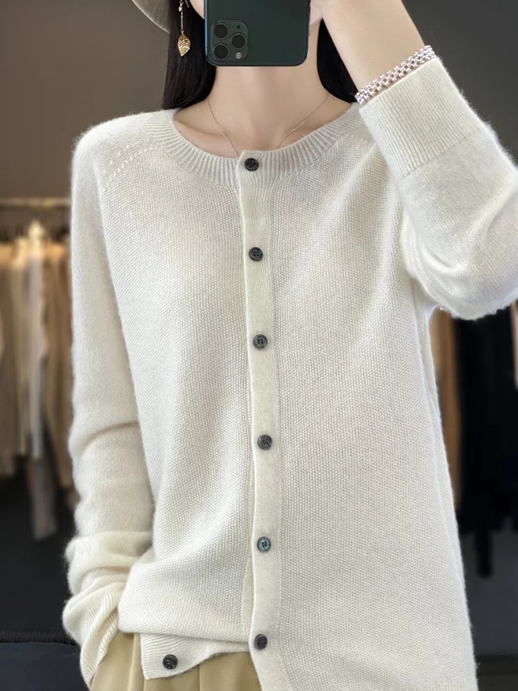Buttoned cardigan styled over a casual outfit, available in multiple colors
