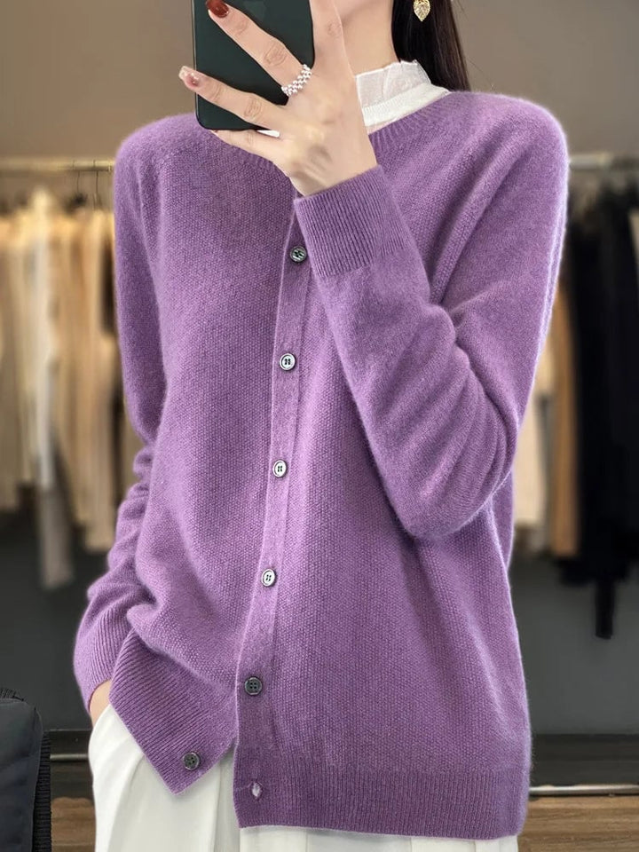 Side view of a soft buttoned cardigan highlighting its flattering fit and classic design