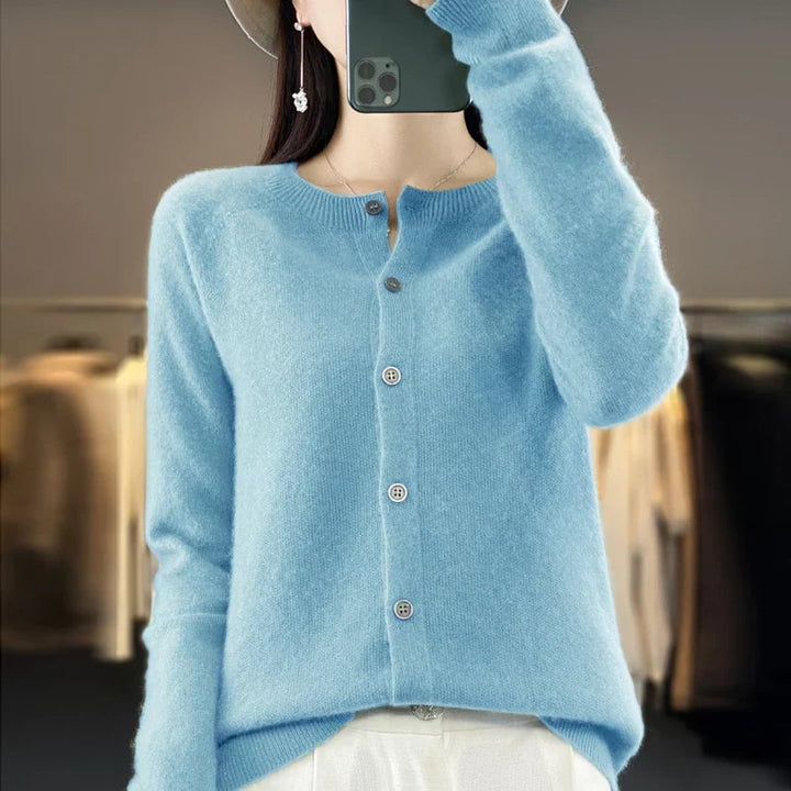 Model wearing a buttoned cardigan in a polished layered look suitable for multiple occasions