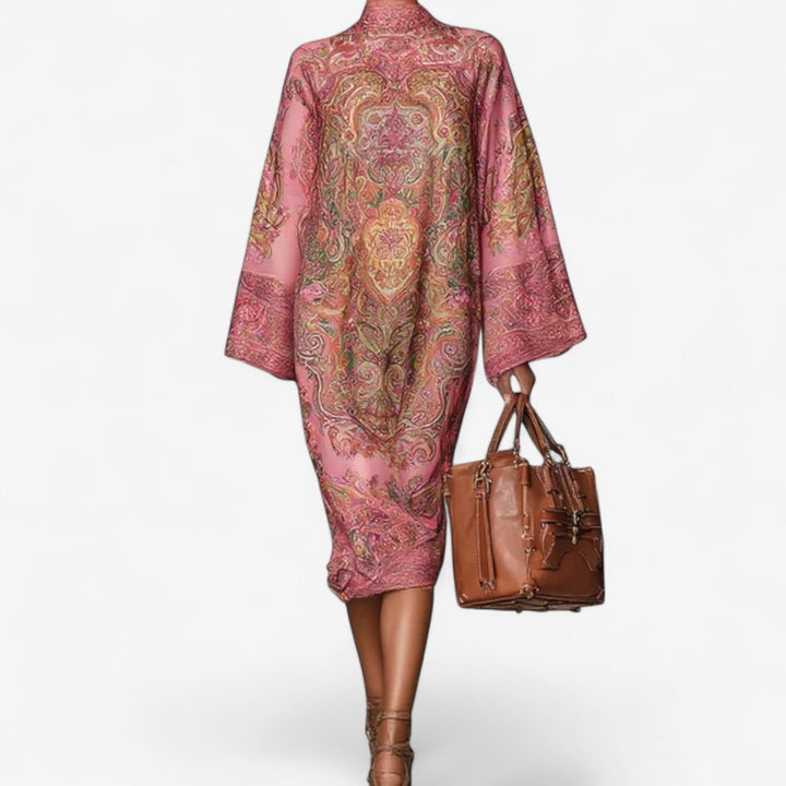 Front view of the Vera printed caftan dress in pink, showing the full-length flowing design