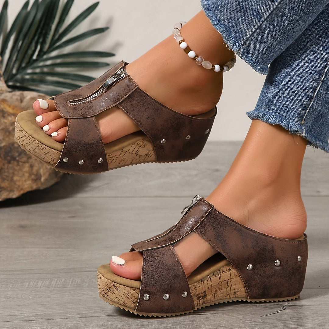 Vera platform wedge sandals in black, front three-quarter view