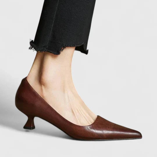 Close-up of the pointed toe and low-cut vamp on the Vera slingback kitten heel in burgundy