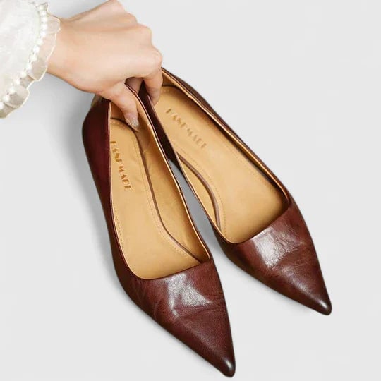 Vera pointed toe slingback kitten heels in black, full side view on white background