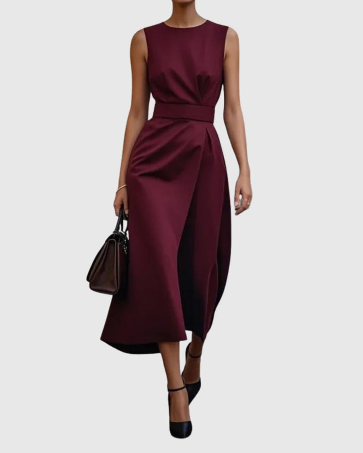 Close-up of twisted knot waist detail on the Vera midi dress
