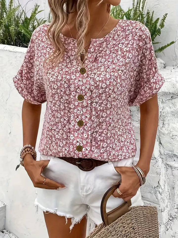 Side view of the flowy floral blouse showing its relaxed, flattering fit