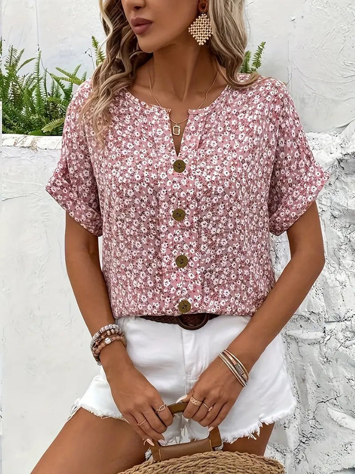 Size and fabric detail graphic for the chic floral print blouse available in sizes S to 5XL