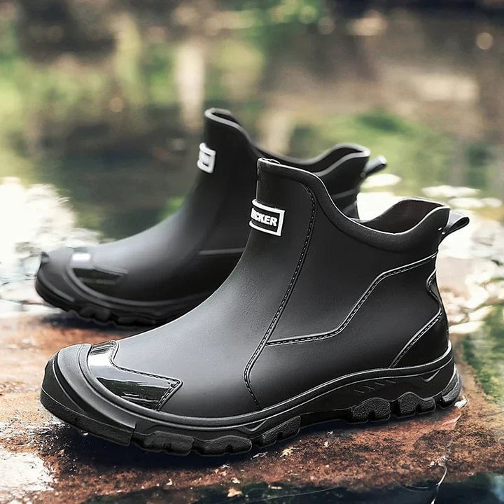 Front view of Canyon knee-high rain boots in black with a sleek waterproof finish