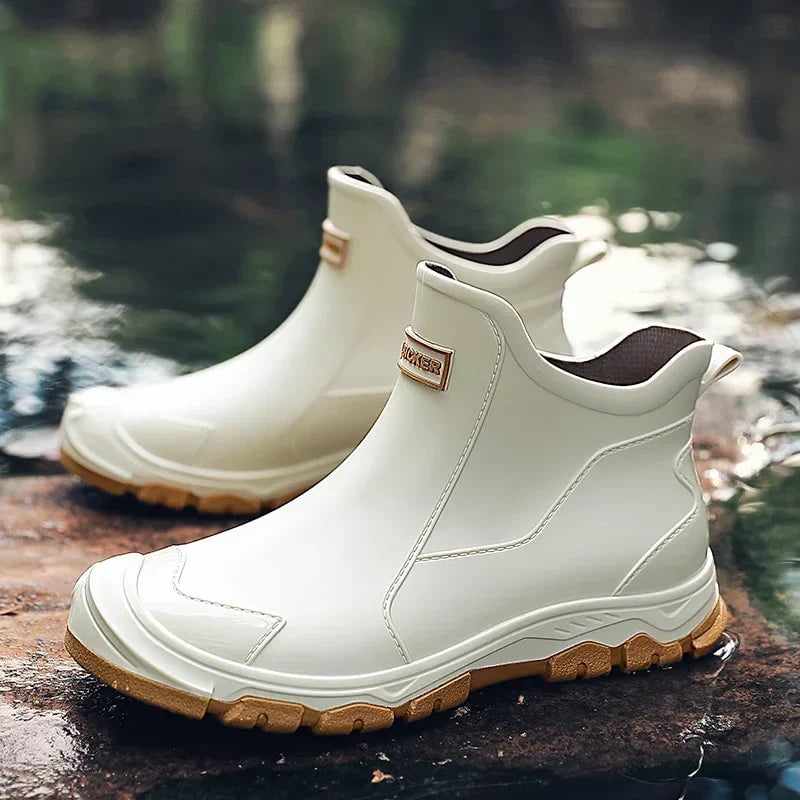 Side profile of Canyon knee-high rain boots showing smooth contoured silhouette
