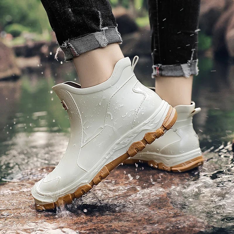 Pair of Canyon rain boots standing upright against a neutral background