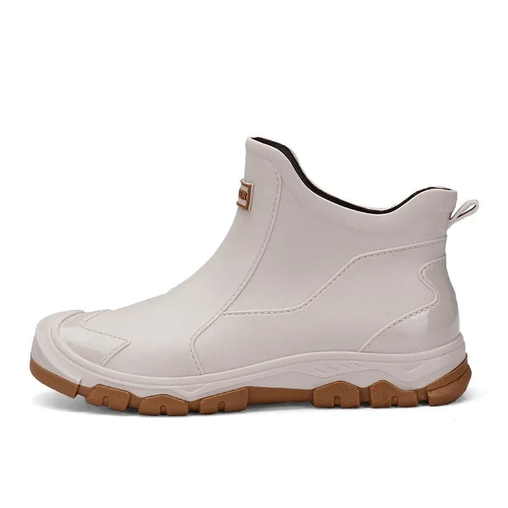 Canyon rain boots worn with a midi skirt showing leg-lengthening effect