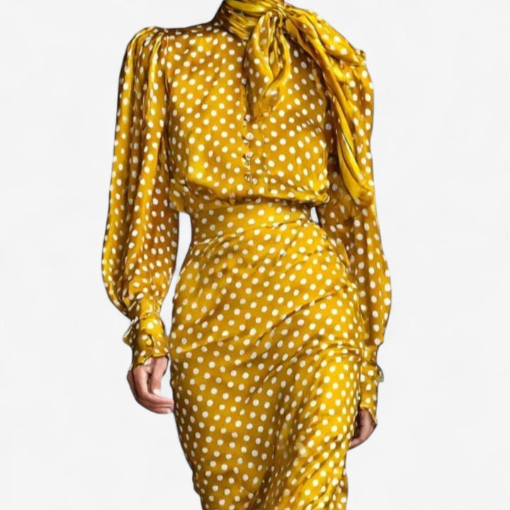 Full-length view of the Vicky classic elegant gold dress styled for a polished day-to-night look