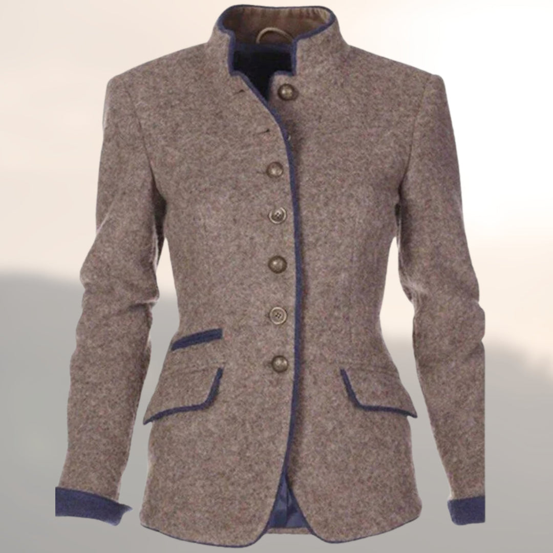 Close-up animated detail of the Victoria handcrafted jacket highlighting artisan stitching and refined finish
