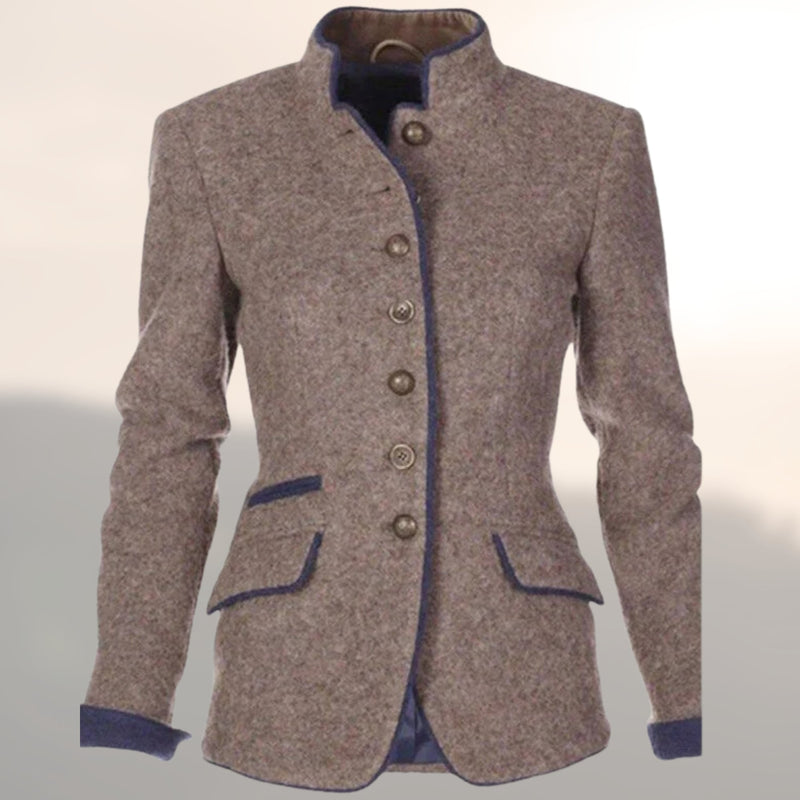 Close-up animated detail of the Victoria handcrafted jacket highlighting artisan stitching and refined finish