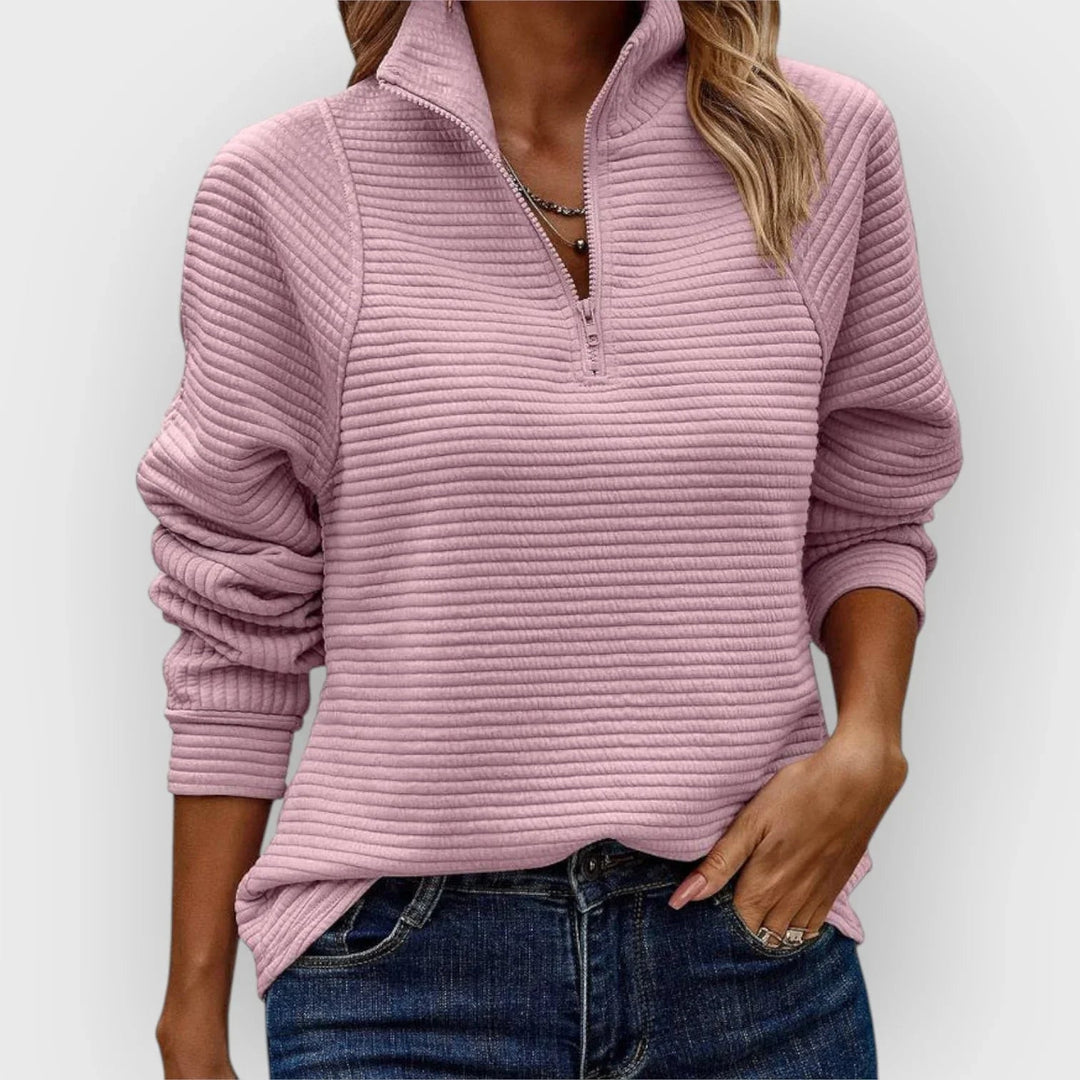 Woman wearing the Victoria halfzip pullover in a relaxed fit, styled casually for everyday wear