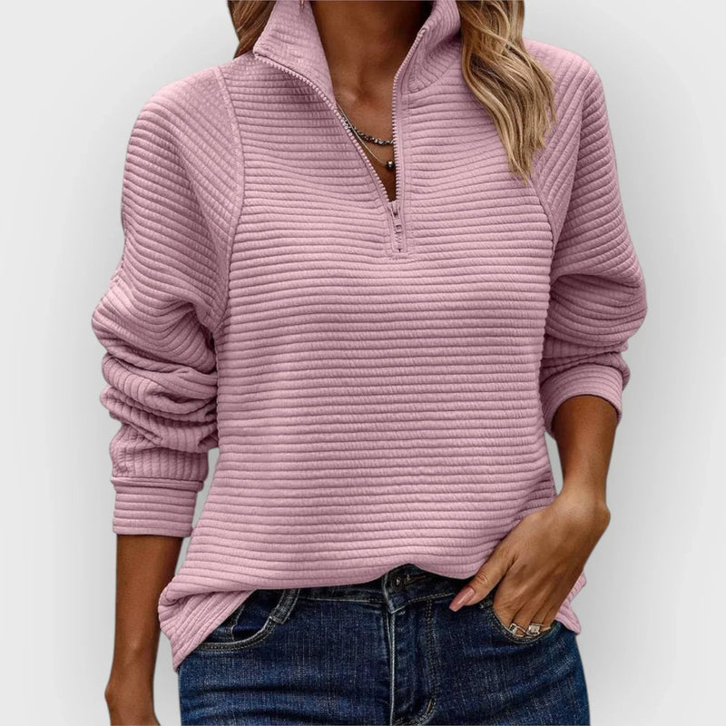 Woman wearing the Victoria halfzip pullover in a relaxed fit, styled casually for everyday wear