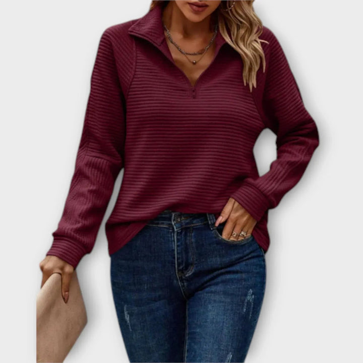 Side angle of the Victoria halfzip pullover showing smooth drape and comfortable everyday fit