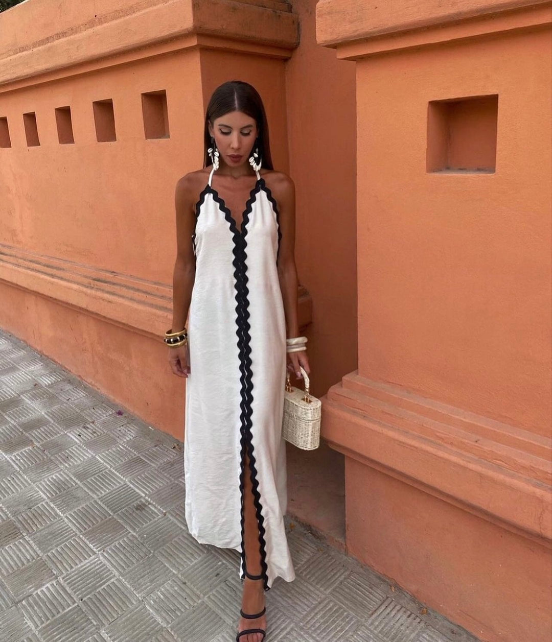 Front view of the Victoria white wrap dress showing the flattering neckline and smooth draped fabric
