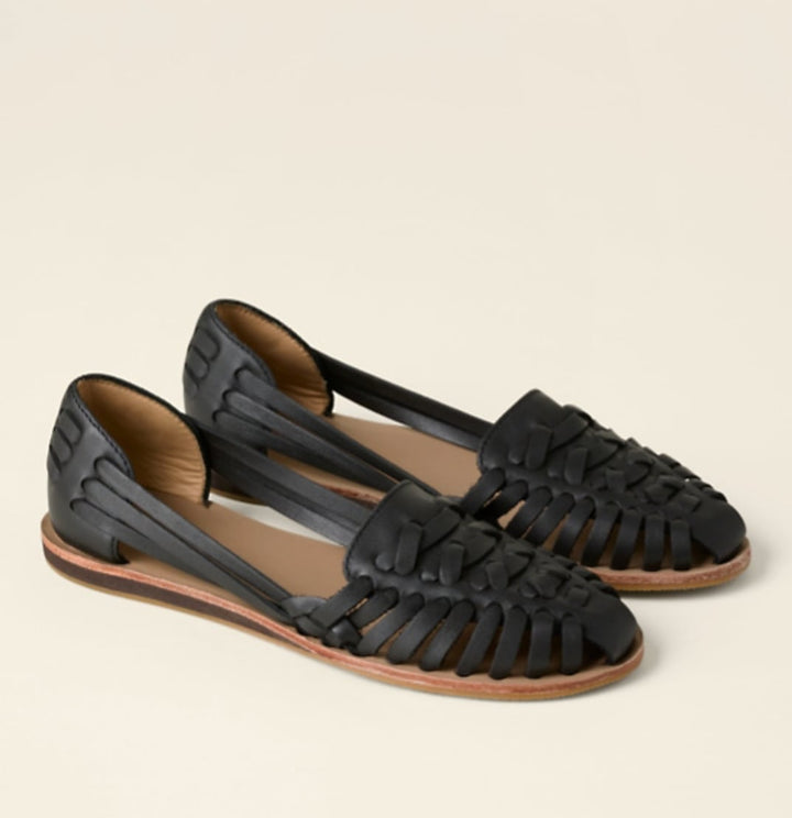 Victoria woven closed-toe flat sandals in black with woven upper detail, front view