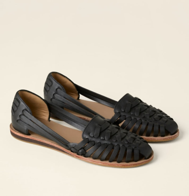 Victoria woven closed-toe flat sandals in black with woven upper detail, front view