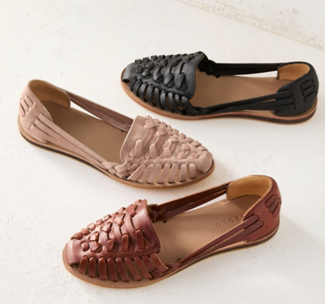 Victoria woven flat sandals styled with a midi skirt, lifestyle shot showing all three color options